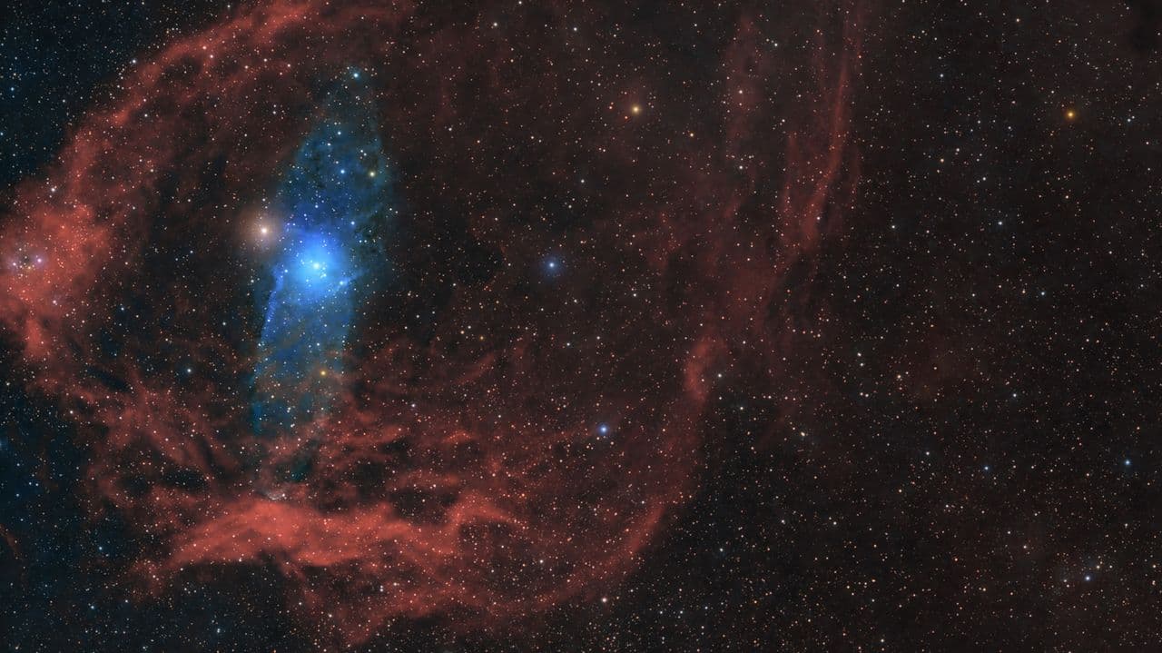 Mysterious 'little red dots' at the beginning time may finally have an explanation, thanks to newfound 'little blue companions'