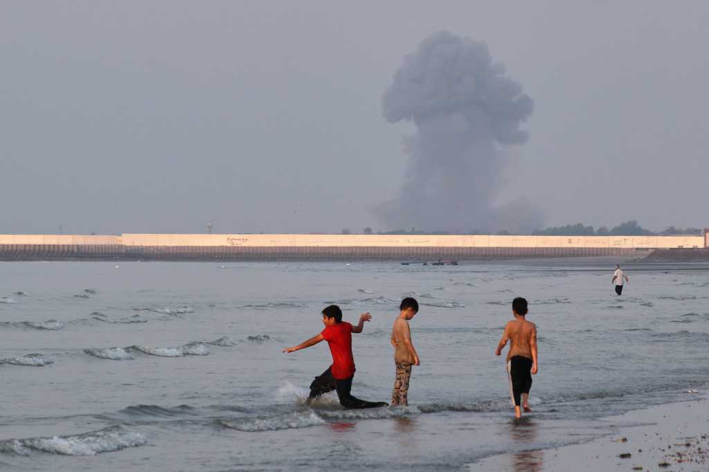 US strikes bridges and collapses tower at port in Iran campaign